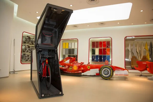 Velohawk weather-proof bike pod in a premium showroom